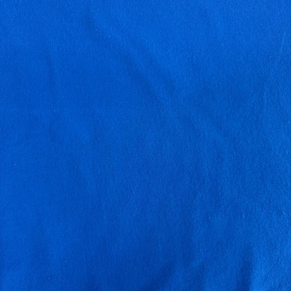 Soft 100% cotton flannelette fabric available in five solid colors: royal blue, pink, grey, mint, and white