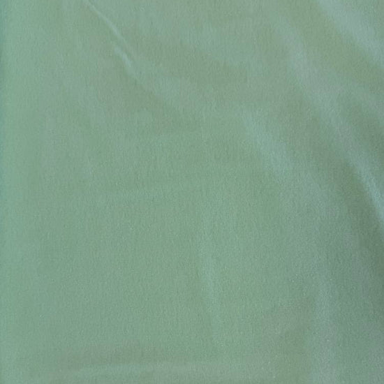 Soft 100% cotton flannelette fabric available in five solid colors: royal blue, pink, grey, mint, and white