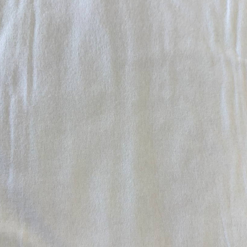 Soft 100% cotton flannelette fabric available in five solid colors: royal blue, pink, grey, mint, and white