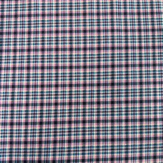 Soft 100% cotton flannelette fabric featuring a blue and purple plaid pattern by Fabric Editions.