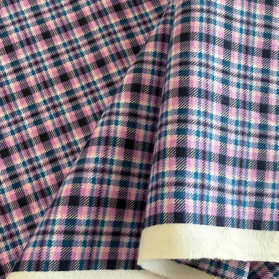 Soft 100% cotton flannelette fabric featuring a blue and purple plaid pattern by Fabric Editions.