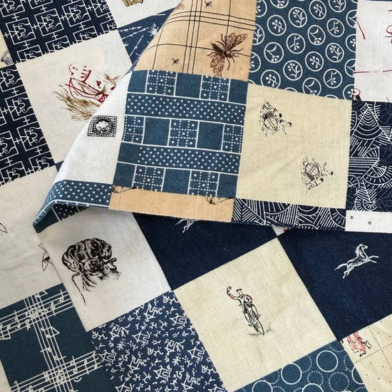 Patchwork-style quilting cotton fabric featuring assorted vintage-inspired prints, sewing motifs, geometric patterns, and western-themed illustrations.