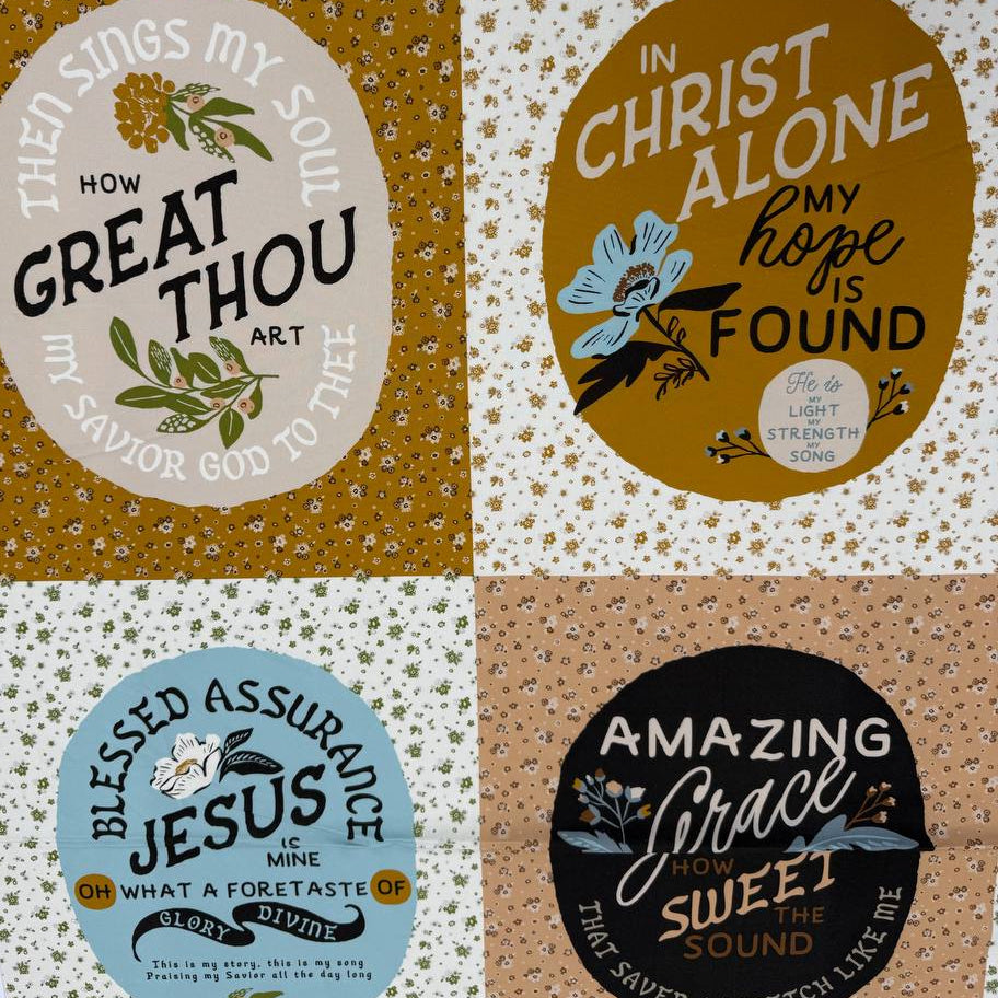 Wellspring inspirational Christian cotton fabric panel by Fancy That Design House for Moda, featuring faith quotes and floral designs in blue, cream, tan and mustard.