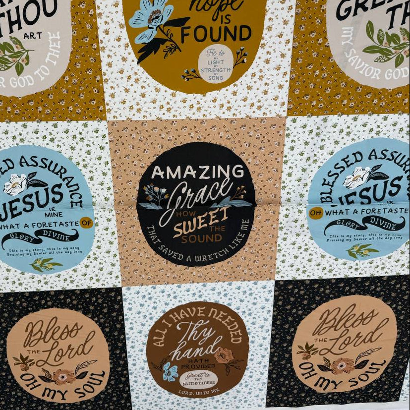 Wellspring inspirational Christian cotton fabric panel by Fancy That Design House for Moda, featuring faith quotes and floral designs in blue, cream, tan and mustard.