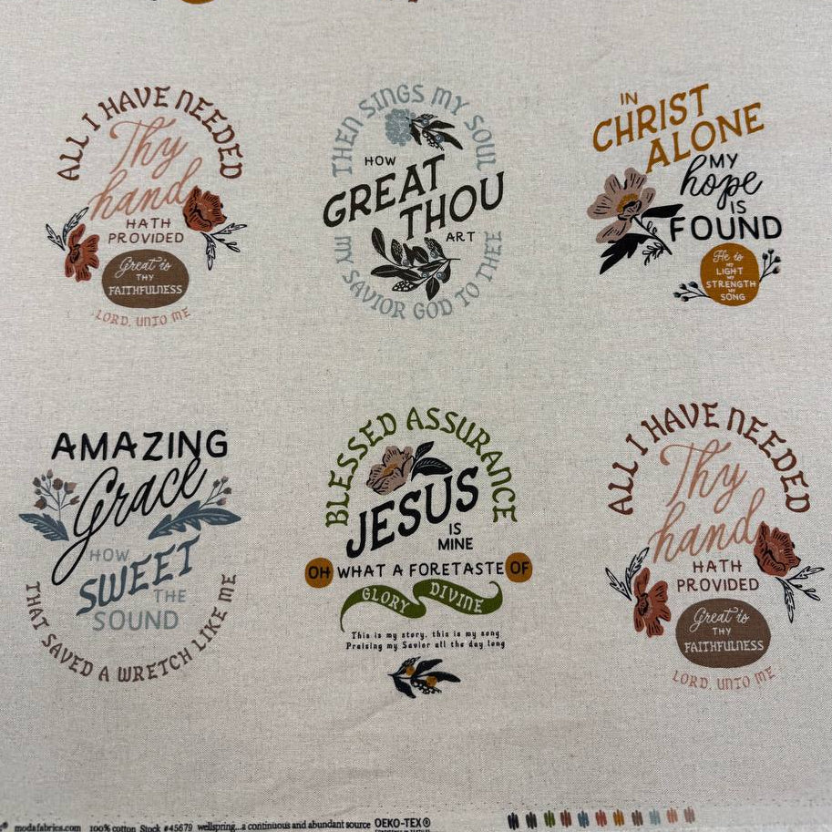 Wellspring Christian fabric panel by Fancy That Design House for Moda Fabrics featuring inspirational faith quotes and floral designs on a natural linen-look background.