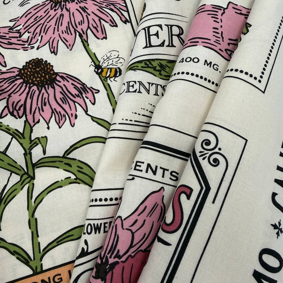 Moda My Secret Garden 100% cotton fabric panel by Stacy Iest Hsu featuring vintage flower seed packet illustrations on a cream background.