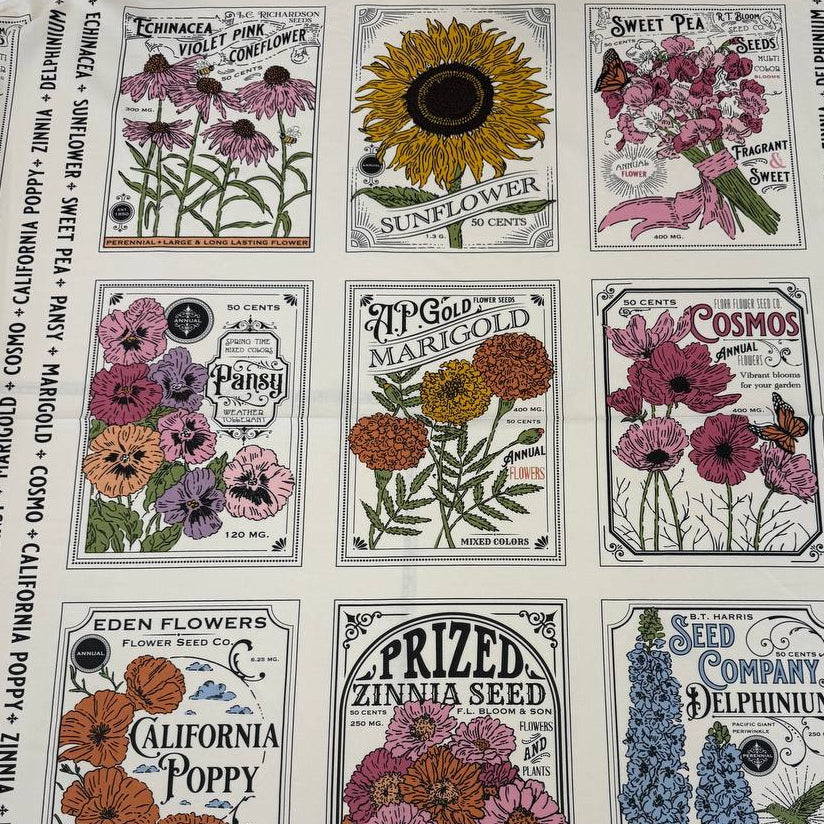 Moda My Secret Garden 100% cotton fabric panel by Stacy Iest Hsu featuring vintage flower seed packet illustrations on a cream background.