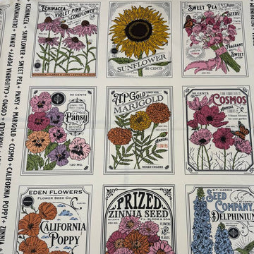 Moda My Secret Garden 100% cotton fabric panel by Stacy Iest Hsu featuring vintage flower seed packet illustrations on a cream background.