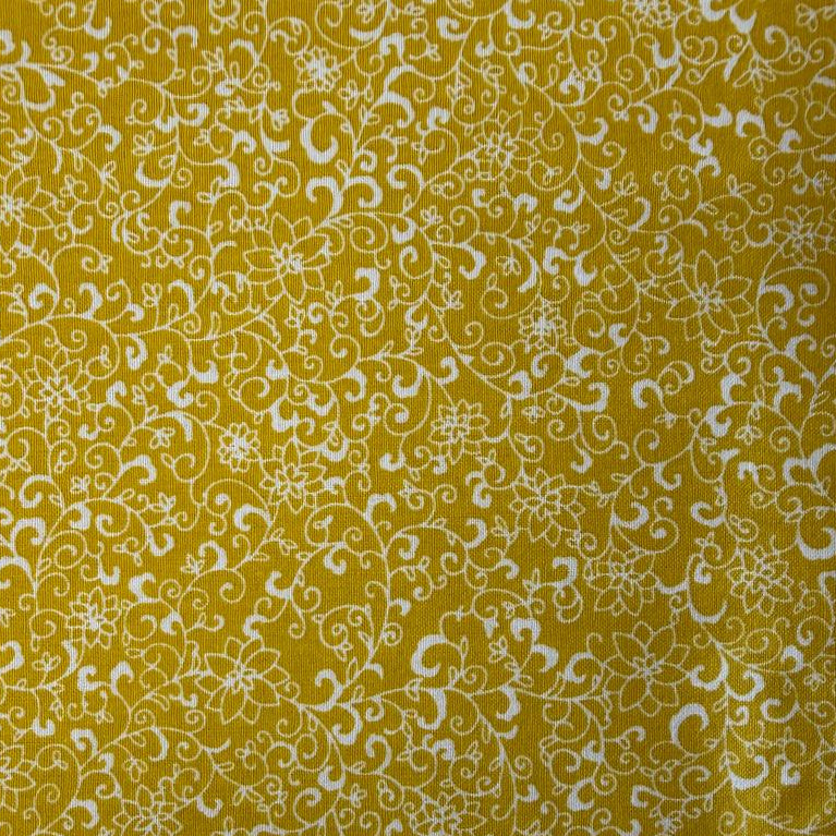 Quilting cotton fabric featuring an all-over floral vine and scrollwork pattern with delicate botanical details.