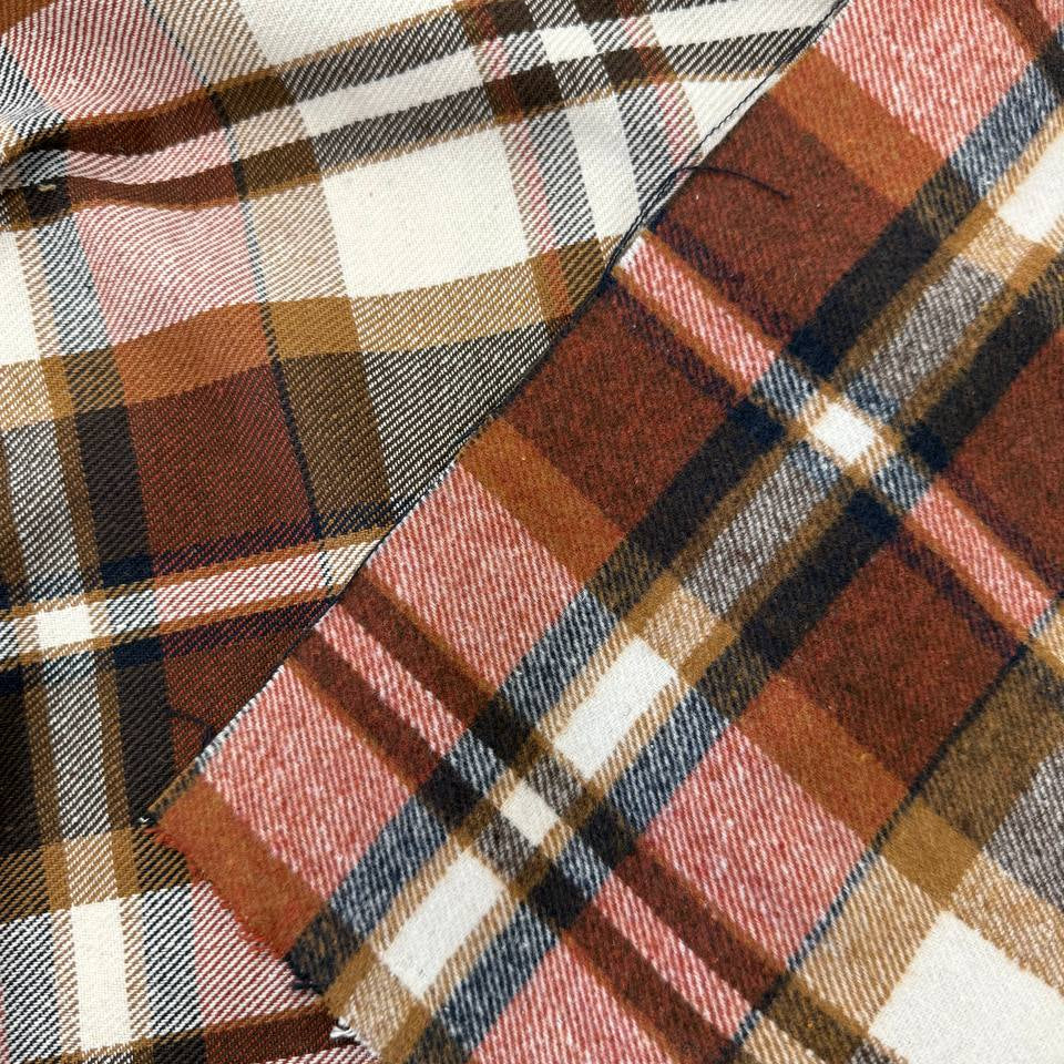 Cream, brown and rust double-sided plaid fabric, 65% polyester and 35% rayon