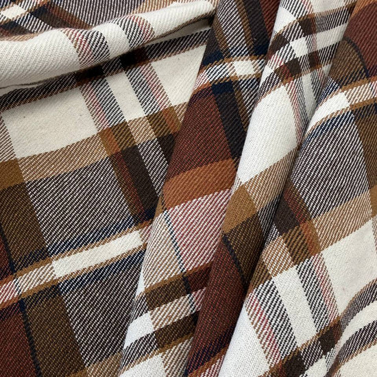 Cream, brown and rust double-sided plaid fabric, 65% polyester and 35% rayon