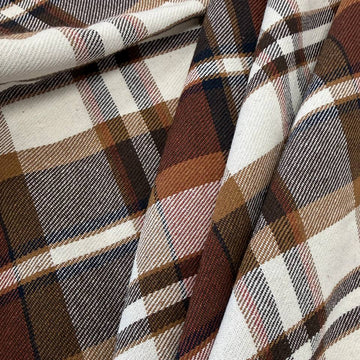 Cream, brown and rust double-sided plaid fabric, 65% polyester and 35% rayon