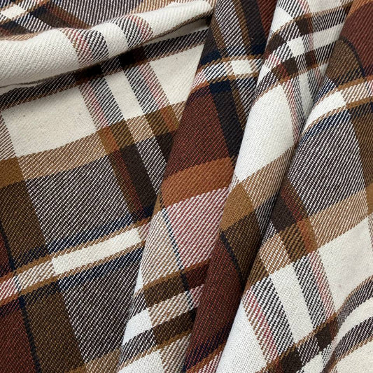 Cream, brown and rust double-sided plaid fabric, 65% polyester and 35% rayon