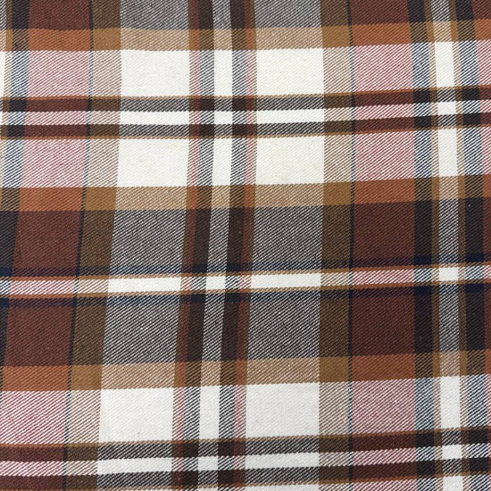Cream, brown and rust double-sided plaid fabric, 65% polyester and 35% rayon