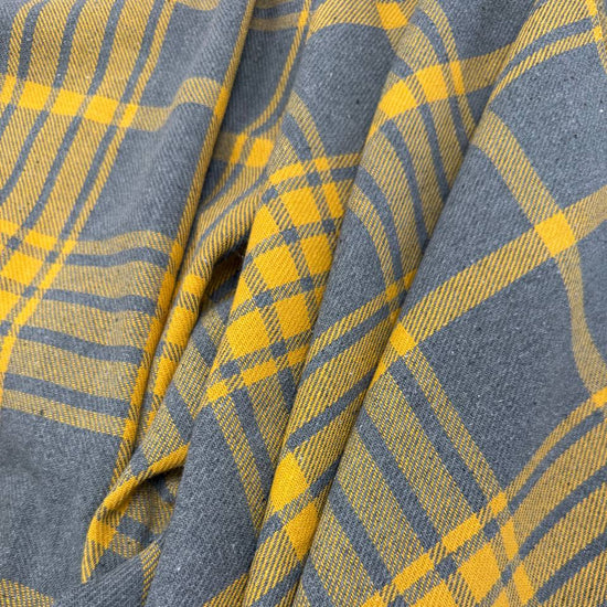Mustard yellow and charcoal grey yarn dyed plaid fabric, 65% polyester and 35% rayon, 60 inches wide.