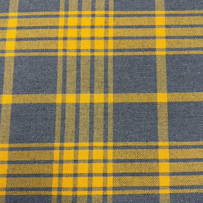 Mustard yellow and charcoal grey yarn dyed plaid fabric, 65% polyester and 35% rayon, 60 inches wide.