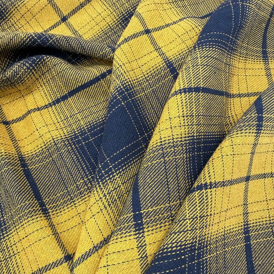 Mustard yellow and navy blue double-sided plaid fabric, 65% polyester and 35% rayon, 60 inches wide.
