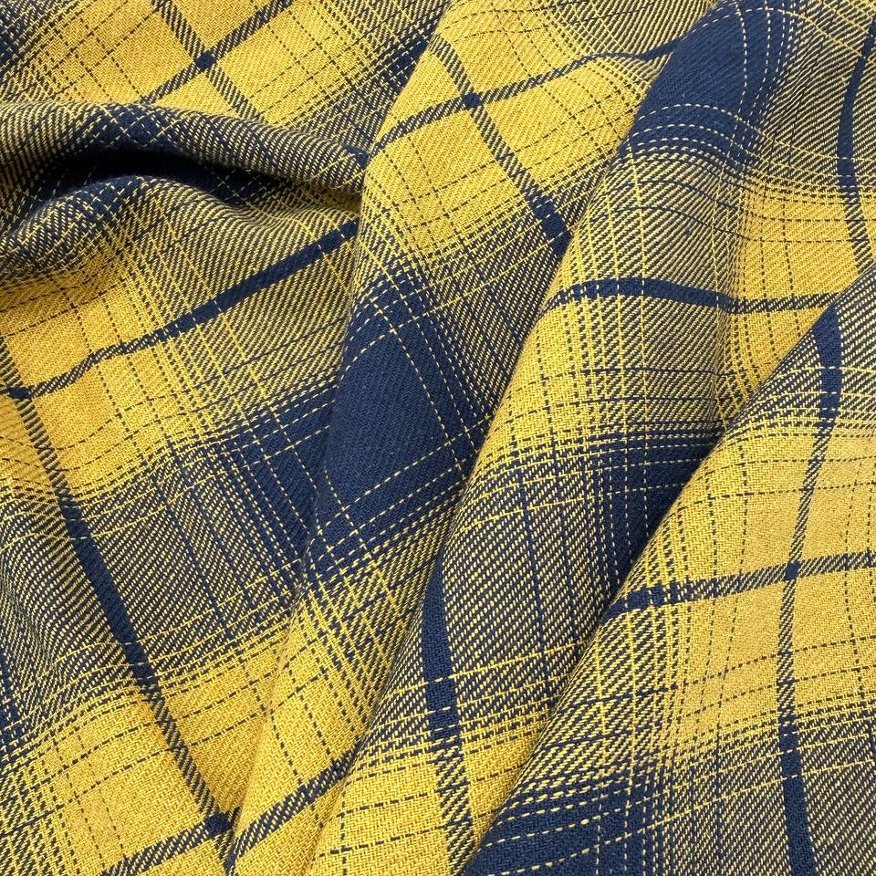 Mustard yellow and navy blue double-sided plaid fabric, 65% polyester and 35% rayon, 60 inches wide.