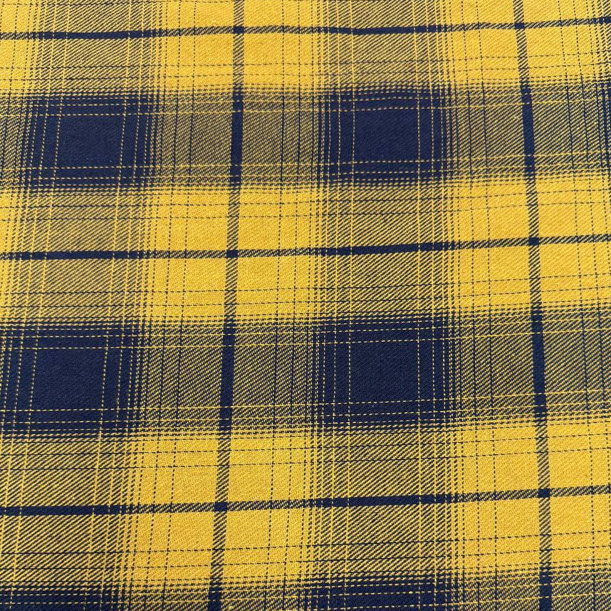 Mustard yellow and navy blue double-sided plaid fabric, 65% polyester and 35% rayon, 60 inches wide.