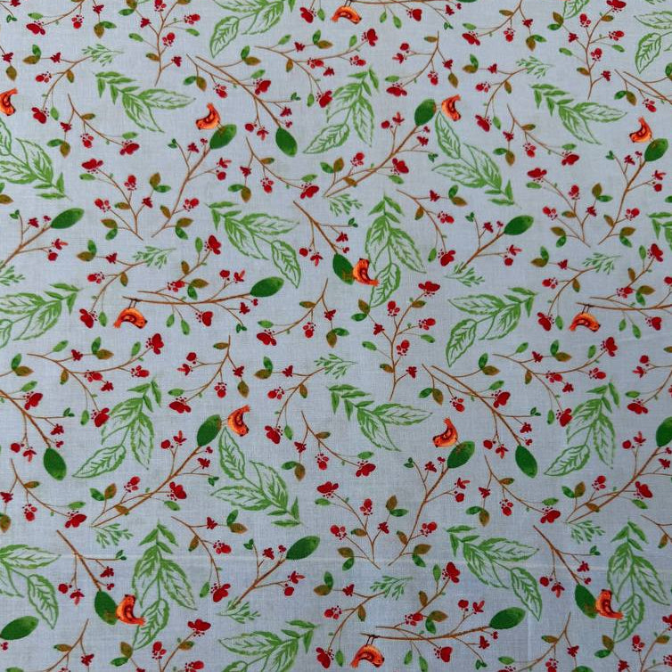 Light blue cotton fabric with delicate green leaves, red berries, and small orange birds scattered throughout the design.