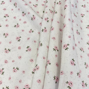 Hollie Rose 100% cotton fabric with small pink roses on a white background