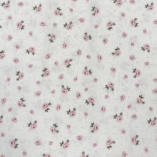 Hollie Rose 100% cotton fabric with small pink roses on a white background