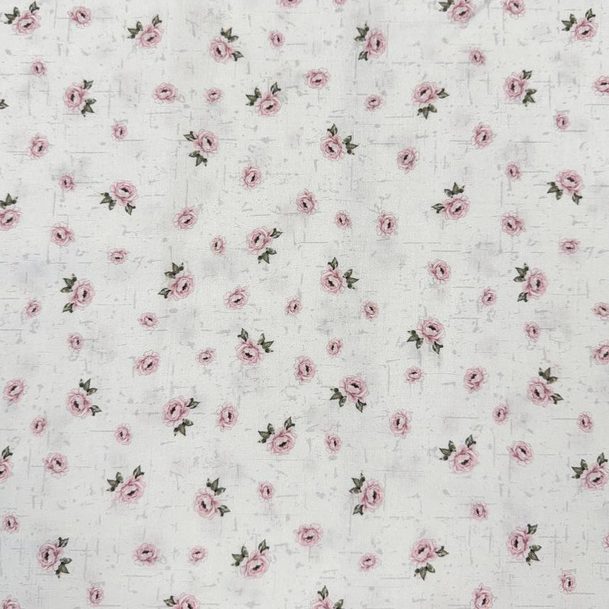 Hollie Rose 100% cotton fabric with small pink roses on a white background
