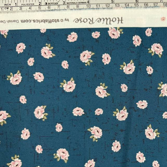 Hollie Rose 100% cotton fabric with small pink roses on a teal background