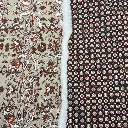 Double-sided quilted cotton fabric with brown floral print and coordinating small geometric print