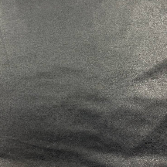 Soft PU Britney faux leather fabric with smooth PU leather-look front and soft suede-like backing, available in Black, Navy, Cognac and Sand.