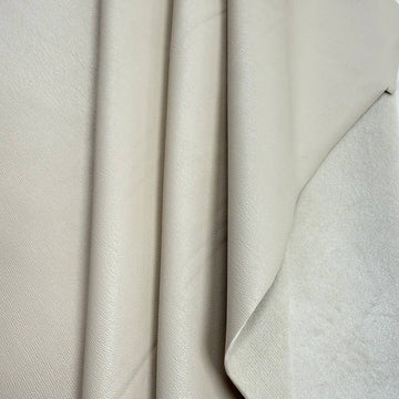 Soft PU Britney faux leather fabric with smooth PU leather-look front and soft suede-like backing, available in Black, Navy, Cognac and Sand.