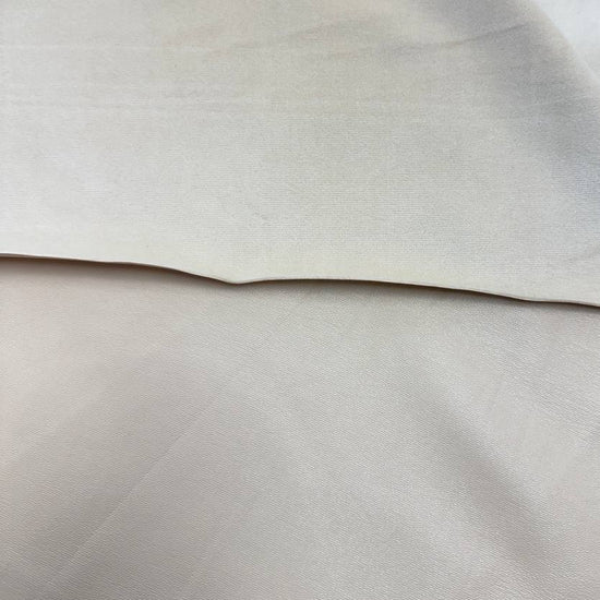Soft PU Britney faux leather fabric with smooth PU leather-look front and soft suede-like backing, available in Black, Navy, Cognac and Sand.