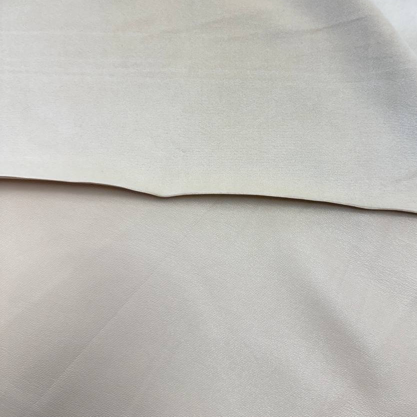 Soft PU Britney faux leather fabric with smooth PU leather-look front and soft suede-like backing, available in Black, Navy, Cognac and Sand.