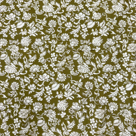 Olive green 100% cotton twill fabric with an intricate white floral and botanical print.