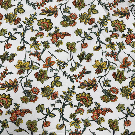 Lightweight 100% cotton poplin fabric with colourful paisley floral print on a white background.