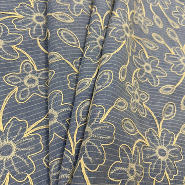 Denim blue pinstripe fabric with cream floral embroidery, 35% cotton and 65% polyester, 150 cm wide
