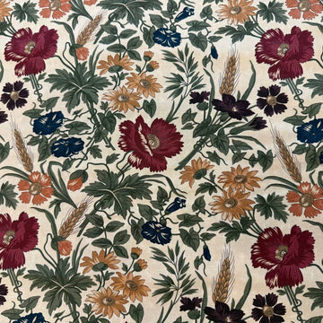 Wheatland floral quilting cotton fabric by Kansas Troubles Quilters for Moda Fabrics featuring vintage flowers, foliage, and wheat motifs in Wheat and Slate colorways.
