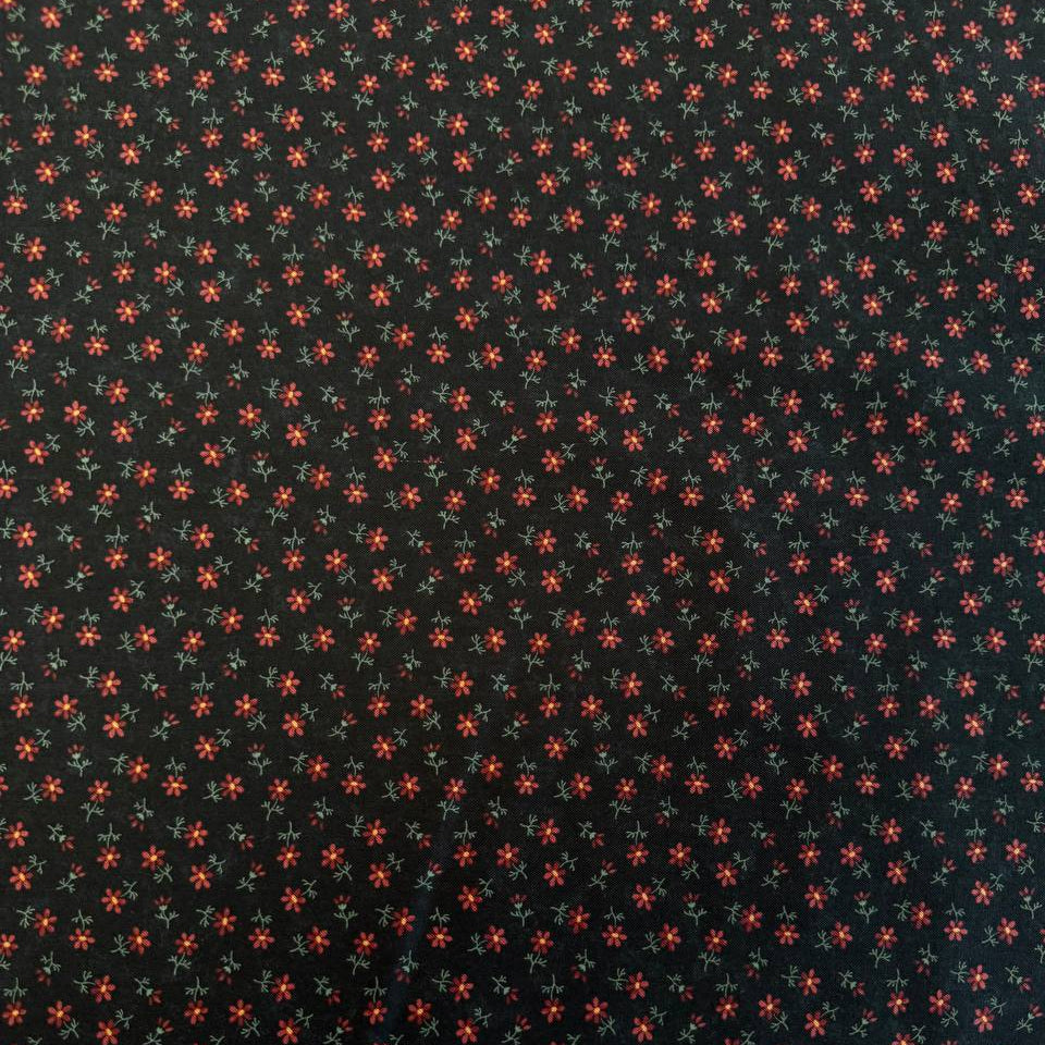 Small floral quilting cotton fabric from the Daisy Lane collection by Kansas Troubles Quilters for Moda Fabrics featuring scattered blossoms in Carnation and Mulch colorways.