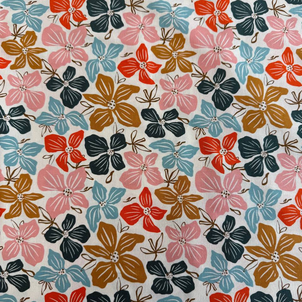 Large floral quilting cotton fabric from the Things Above collection by Fancy That Design House for Moda Fabrics featuring colorful hand-drawn flowers on Eggshell, Cocoa, and Water backgrounds.