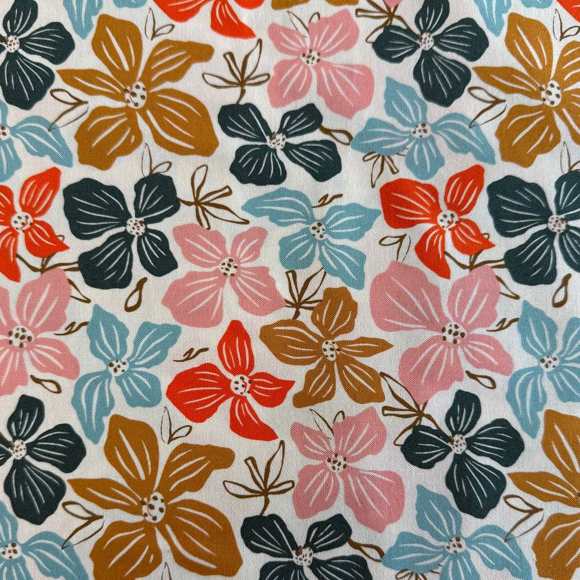 Large floral quilting cotton fabric from the Things Above collection by Fancy That Design House for Moda Fabrics featuring colorful hand-drawn flowers on Eggshell, Cocoa, and Water backgrounds.