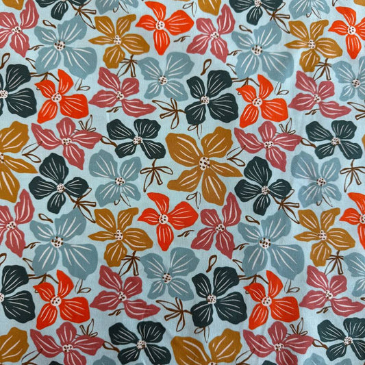 Large floral quilting cotton fabric from the Things Above collection by Fancy That Design House for Moda Fabrics featuring colorful hand-drawn flowers on Eggshell, Cocoa, and Water backgrounds.