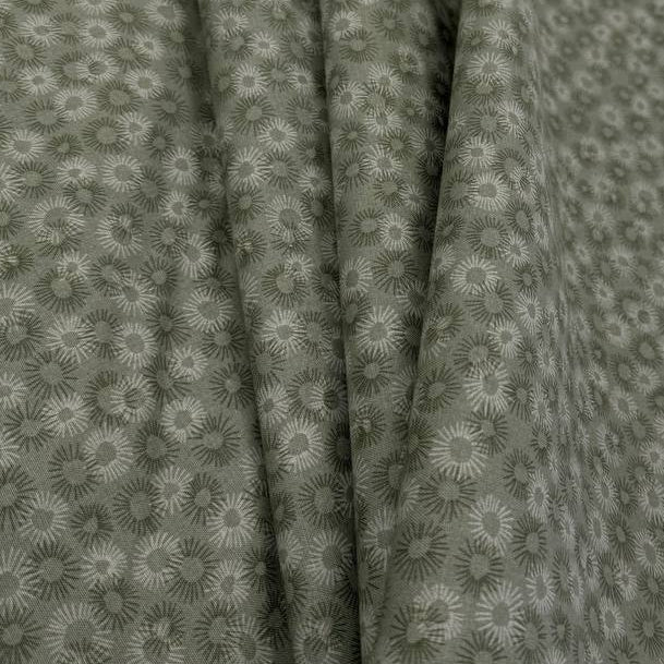 100% cotton tonal sunburst print fabric available in blue, sage green, charcoal grey and cream, 60 inches wide.