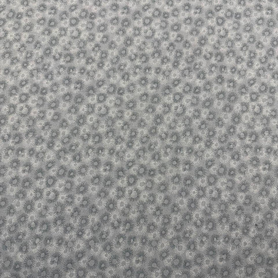 100% cotton tonal sunburst print fabric available in blue, sage green, charcoal grey and cream, 60 inches wide.