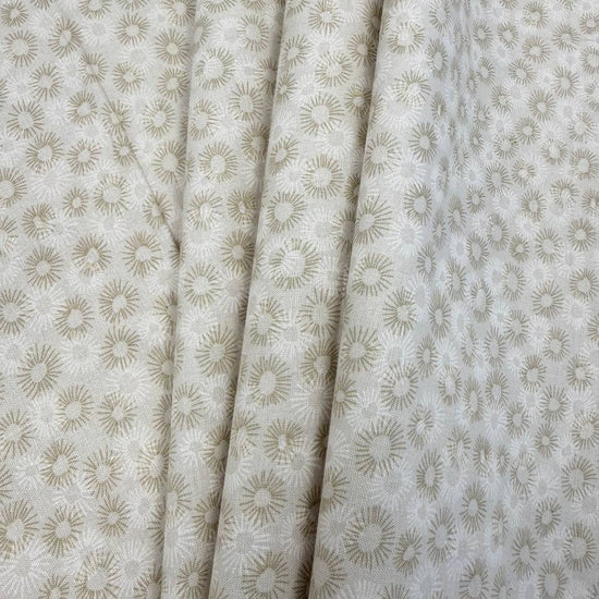 100% cotton tonal sunburst print fabric available in blue, sage green, charcoal grey and cream, 60 inches wide.