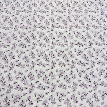 White cotton poplin fabric with delicate lilac floral print, 100% cotton, 150 cm wide, Sasha’s Atelier.