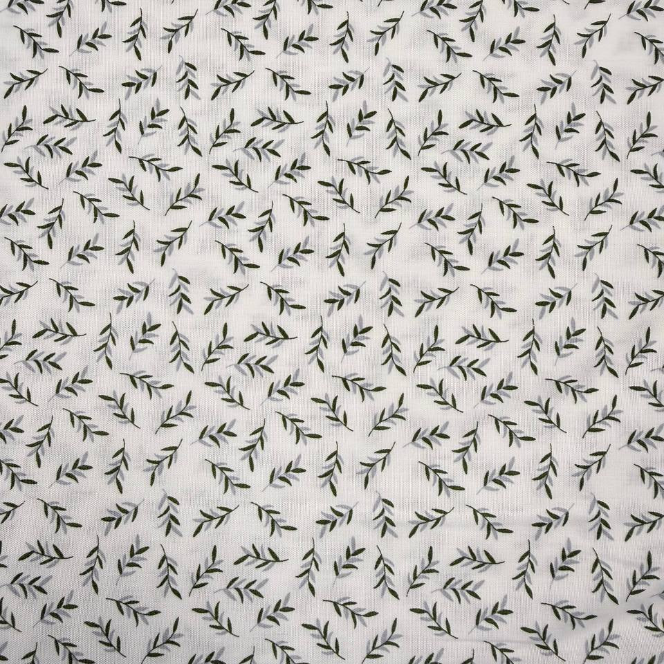 Ecru 100% cotton poplin fabric with delicate small green leaf print, 150 cm wide – Sasha’s Atelier.