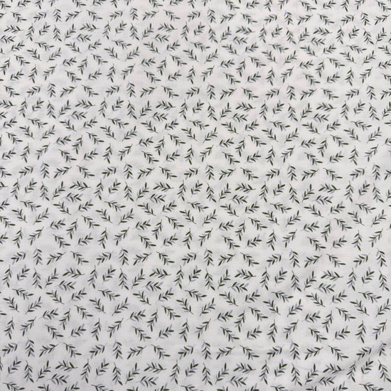 Ecru 100% cotton poplin fabric with delicate small green leaf print, 150 cm wide – Sasha’s Atelier.