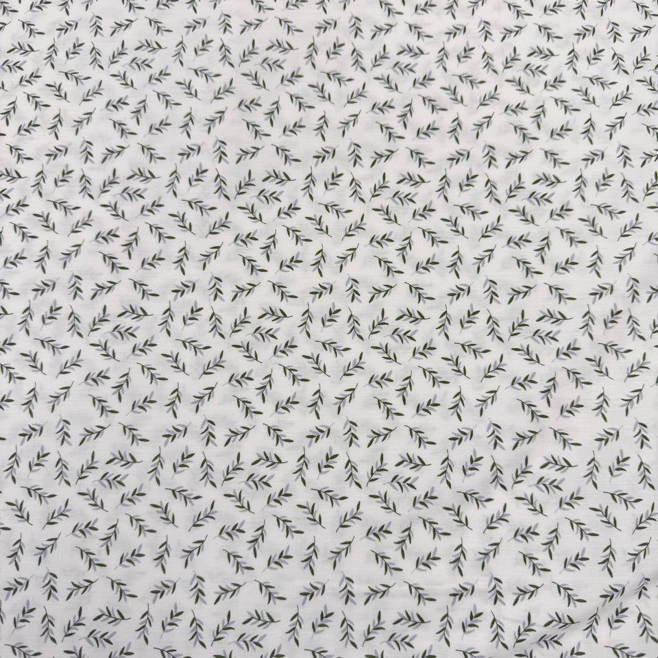 Ecru 100% cotton poplin fabric with delicate small green leaf print, 150 cm wide – Sasha’s Atelier.
