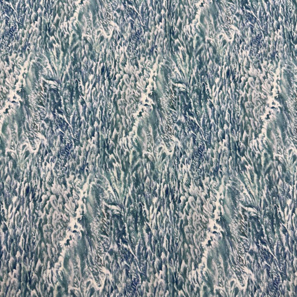 Northcott Naturescapes Voyage blue multi 100% cotton fabric featuring a realistic ocean wave and foamy water print.