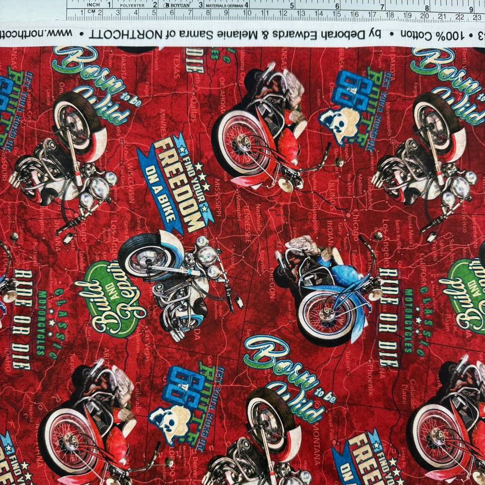 Northcott Historic Route 66 Motorcycle Toss red multi 100% cotton fabric featuring vintage motorcycles, Route 66 graphics and road map design.